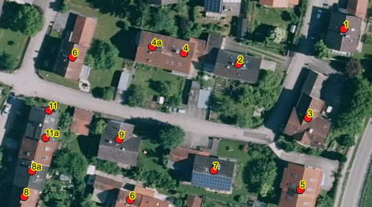 Luftbild von Gebäuden mit darüber liegenden Hauskoordinaten